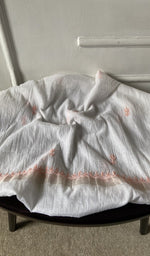 Bottom fabric draped over the stool