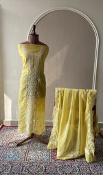 Yellow cotton set on the mannequin with its dupatta