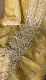 Fine chikankari on panel and motifs on the yellow cotton