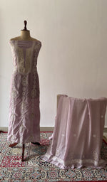 The set on the mannequin with its dupatta beside it