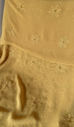 Hem and border of the yellow dupatta