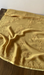 Folded stack, yellow viscose georgette