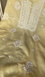 Fine chikankari on the lemon yellow cotton
