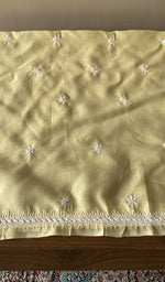 Close view of the lemon yellow kurta fabric
