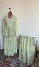 The set on the mannequin with its dupatta beside it
