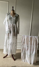 The set on the mannequin with its dupatta beside it