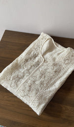 White pure mul chanderi kurti piece folded, fine chikankari