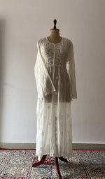 The set on the mannequin with its dupatta beside it