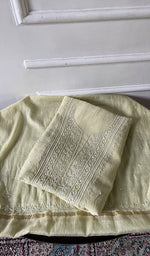 Load image into Gallery viewer, pale yellow pure mul chanderi chikankari 3 pc unstitched suit set, folded