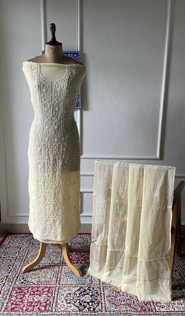 ivory pure mul chanderi chikankari 3 pc unstitched suit set on mannequin