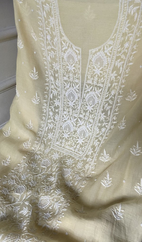 close view of the hand embroidery, ivory pure mul chanderi