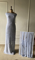 The set on the mannequin with its dupatta beside it