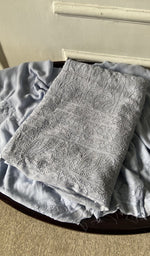 The folded set, kurta on top
