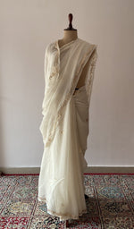 Off white pure mul chanderi saree draped on the mannequin