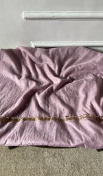 Bottom fabric draped over the stool