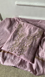 The folded set, kurta on top
