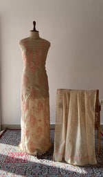 The set on the mannequin with its dupatta beside it