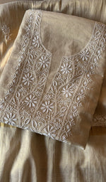 Folded beige tissue chanderi kurta, front view