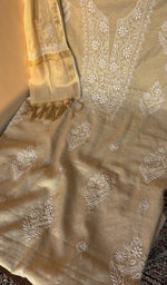 Beige tissue chanderi laid out flat