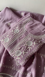 Folded kurta piece and dupatta, chikankari along the hem