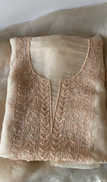 Beige pure organza silk kurta piece folded, do taar and teen taar chikankari