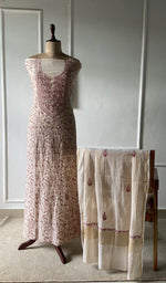 The set on the mannequin with its dupatta beside it