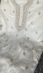Chikankari worked by hand on eri silk
