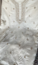 Cream eri silk laid out flat