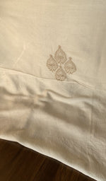 Close view of the ivory kurta fabric