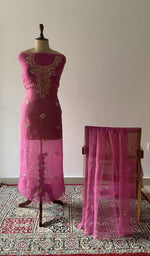 The set on the mannequin with its dupatta beside it
