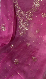 Motifs across the body of the pink kurta