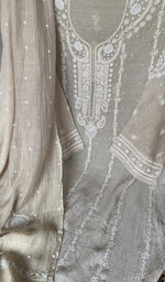 Beads and cutdana along the placket