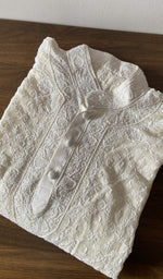 The kurta piece folded again