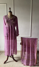 The set on the mannequin with its dupatta beside it