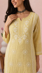 Yellow kurti upper body with the neckline chikankari