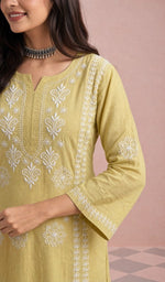 Yellow kurti, sleeve and chikankari up close