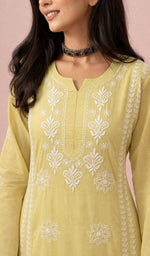 Yellow kurti, neckline and yoke embroidery up close