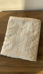 Folded beige munga silk kurta, front view