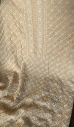 Chikankari worked by hand on munga silk