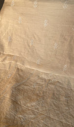 Close view of the beige kurta fabric