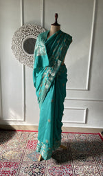 Load image into Gallery viewer, teal green pure silk chikankari saree draped on the mannequin