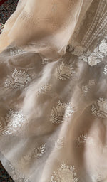 Peach organza silk laid flat on the table