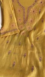 Mustard mul chanderi laid flat on the table