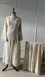 The set on the mannequin with its dupatta beside it