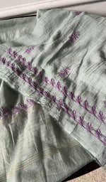 border and hem of the green kurta piece
