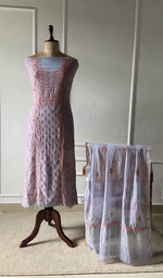The set on the mannequin with its dupatta beside it