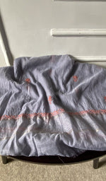 Bottom fabric draped over the stool