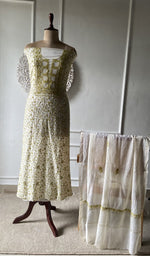 off white pure mul chanderi chikankari set on the mannequin with the dupatta