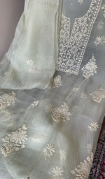 Ivory organza silk laid out flat