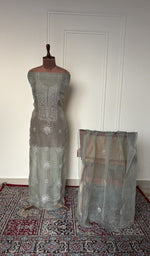 Sage grey organza silk set on the mannequin with its dupatta